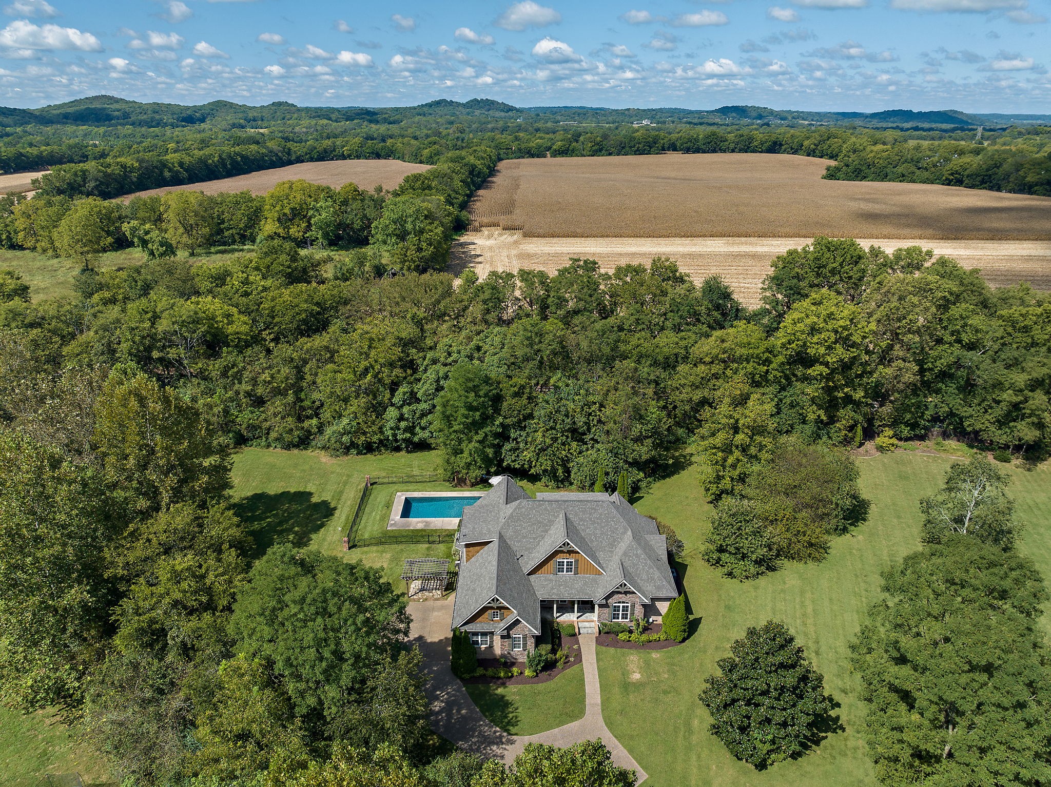 1420 Hunter Road Franklin, TN 37064 - Photo 52 of 57 an aerial view of a house with a garden