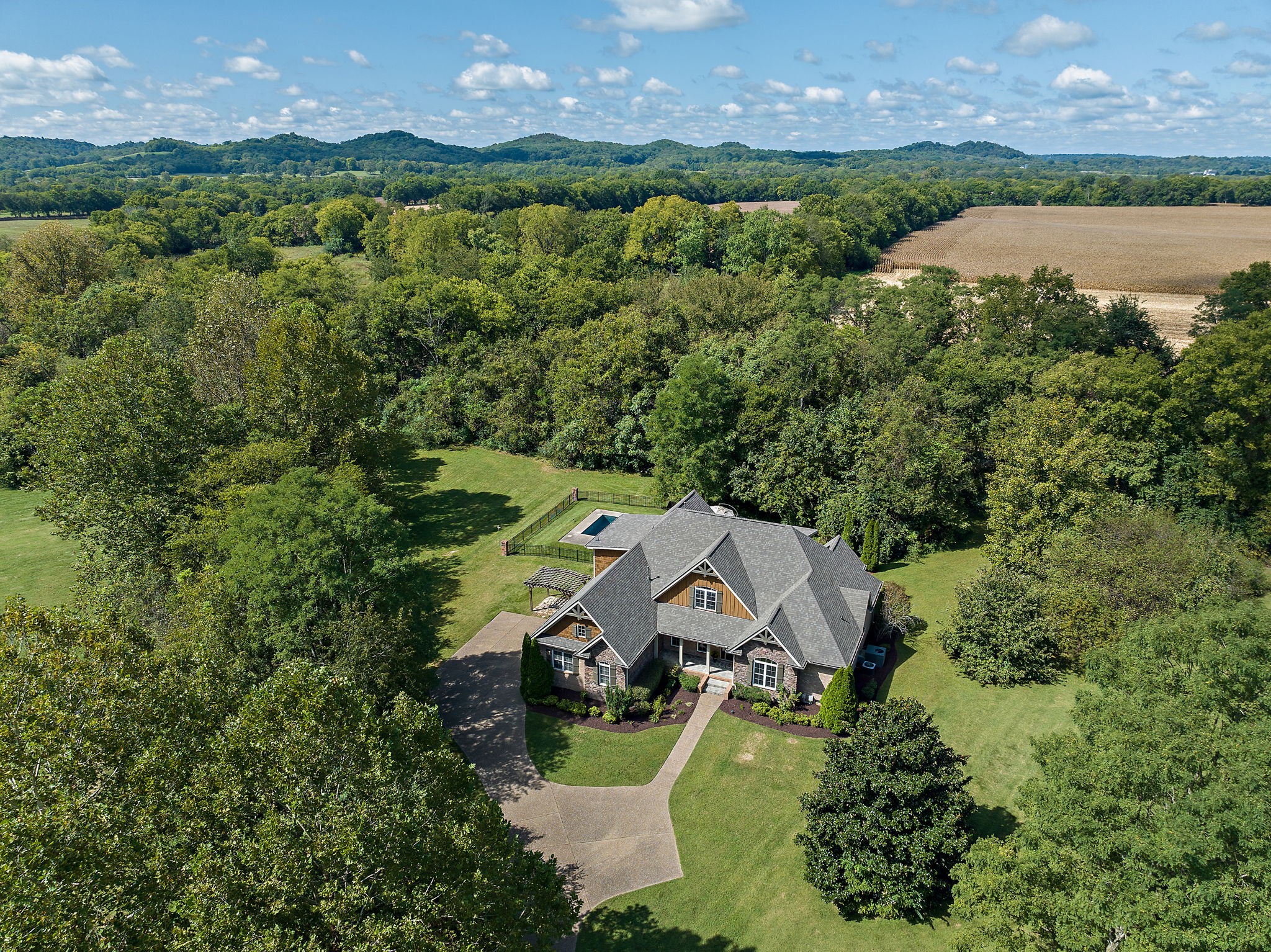 1420 Hunter Road Franklin, TN 37064 - Photo 53 of 57 an aerial view of a house with a garden and a yard