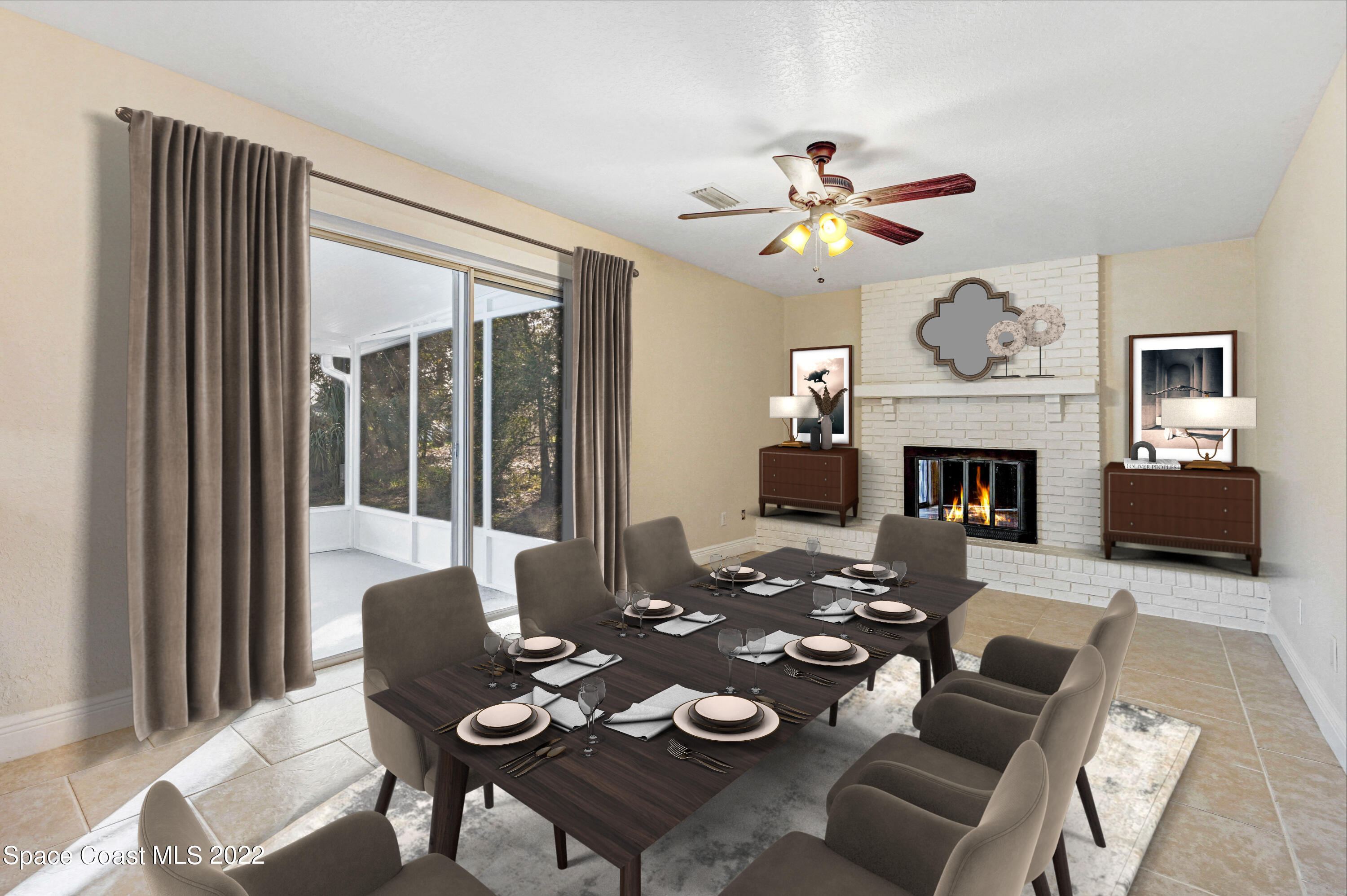 1074 Castile Road Southeast Palm Bay, FL 32909 - Photo 14 of 40 a living room with furniture a fireplace and a large window