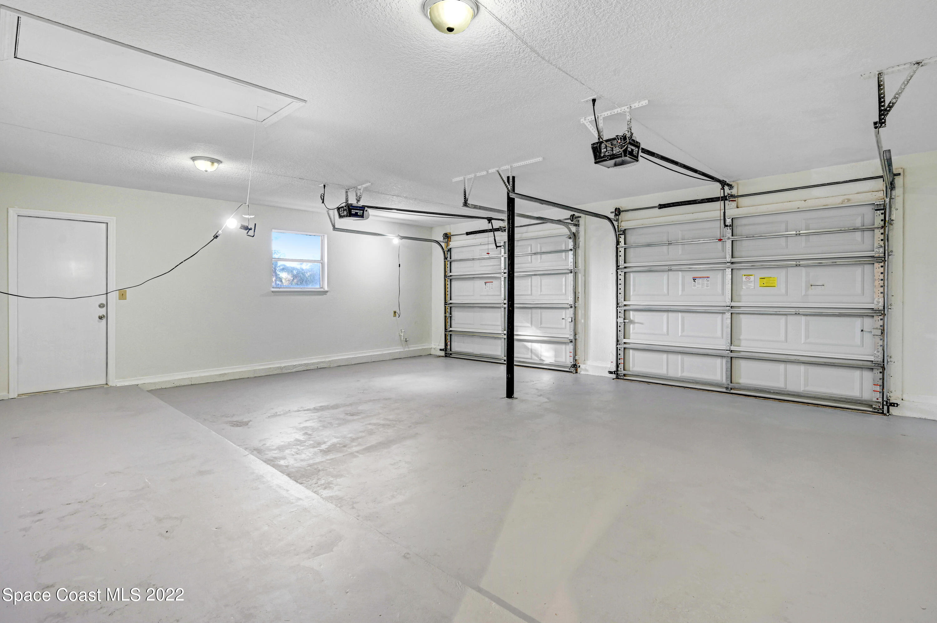 1074 Castile Road Southeast Palm Bay, FL 32909 - Photo 37 of 40 a view of a garage room