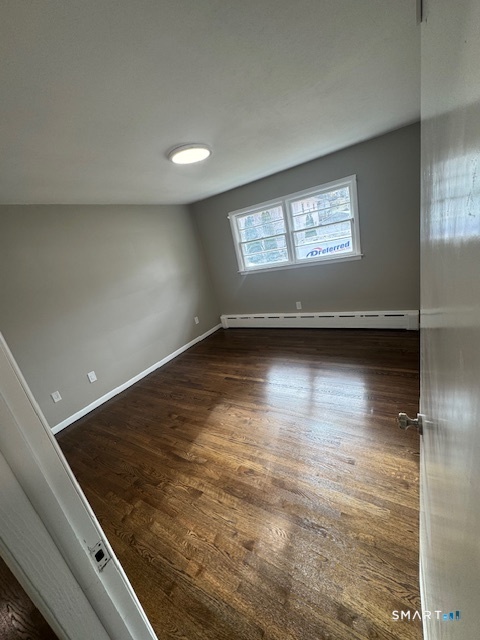 150 Kaynor Drive Waterbury, CT 06708 - Photo 6 of 13 a view of an empty room and window