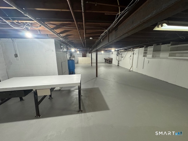 150 Kaynor Drive Waterbury, CT 06708 - Photo 10 of 13 a view of a hallway with wooden floor