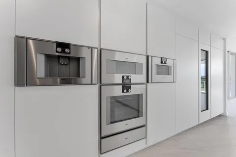 a view of an chairs and table in patio