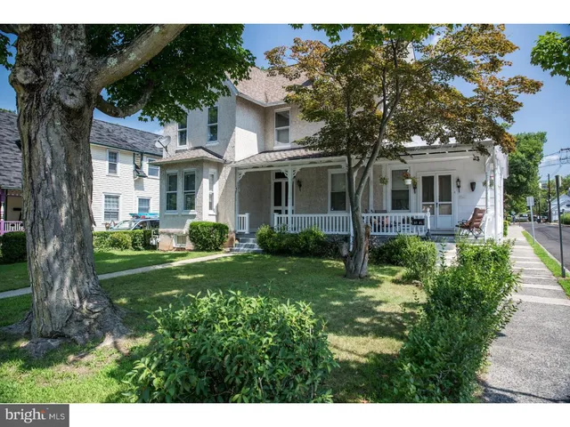 a view of a front of house with a garden