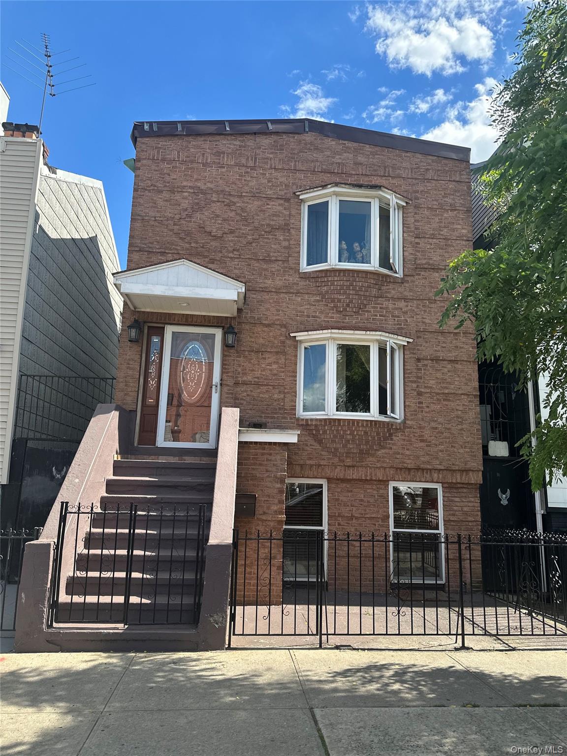 28 Maspeth Avenue Brooklyn, NY 11211 - Photo 1 of 21 a front view of a house