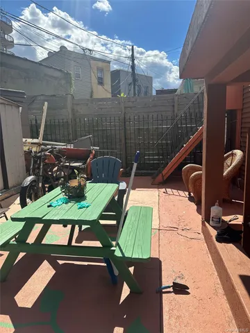 a view of yard with patio