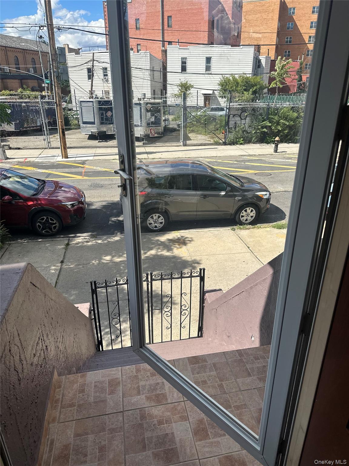 28 Maspeth Avenue Brooklyn, NY 11211 - Photo 4 of 21 a view of a building from a window