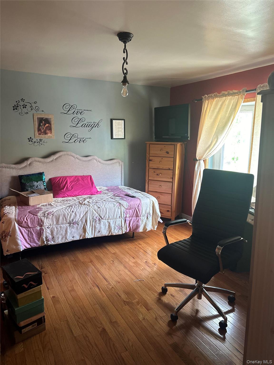 28 Maspeth Avenue Brooklyn, NY 11211 - Photo 10 of 21 a bedroom with a bed chair and a window