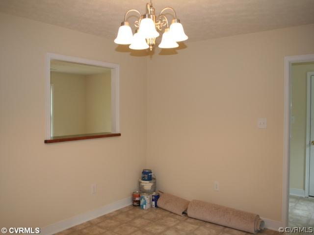 18 Winding Ridge Way Bumpass, VA 23024 - Photo 4 of 17 a view of a small space with wooden floor and a window