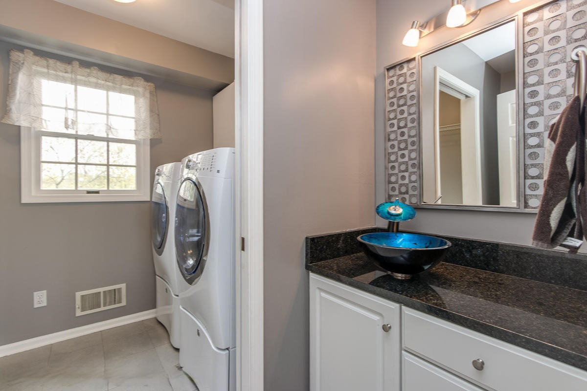 1744 Riva Ridge Drive Southeast Grand Rapids, MI 49546 - Photo 15 of 24 Powder Room & Laundry