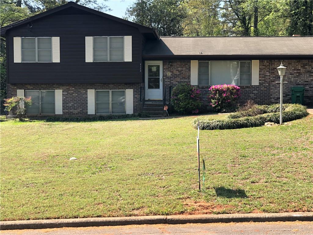 a front view of house with yard