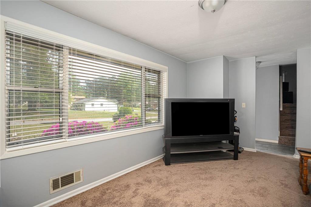 4123 Shorter Way Decatur, GA 30034 - Photo 4 of 14 a living room with furniture and a flat screen tv