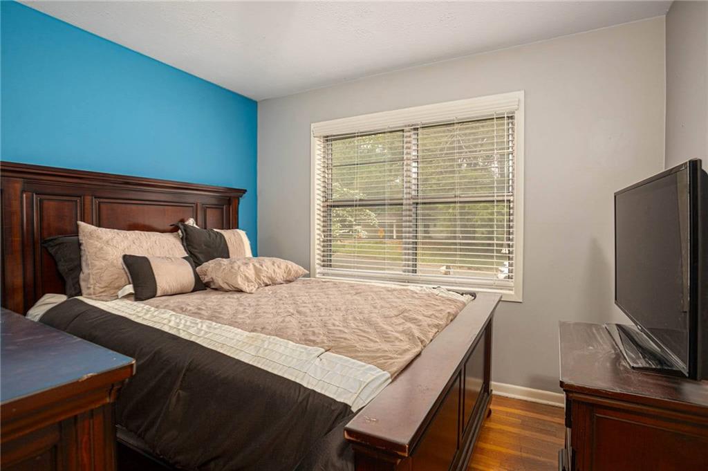 4123 Shorter Way Decatur, GA 30034 - Photo 10 of 14 a bedroom with a bed and a flat screen tv