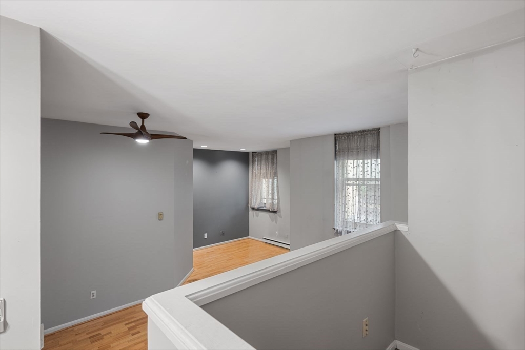 350 West Fourth Street, Unit 103 Boston, MA 02127 - Photo 19 of 33 a view of an empty room with window