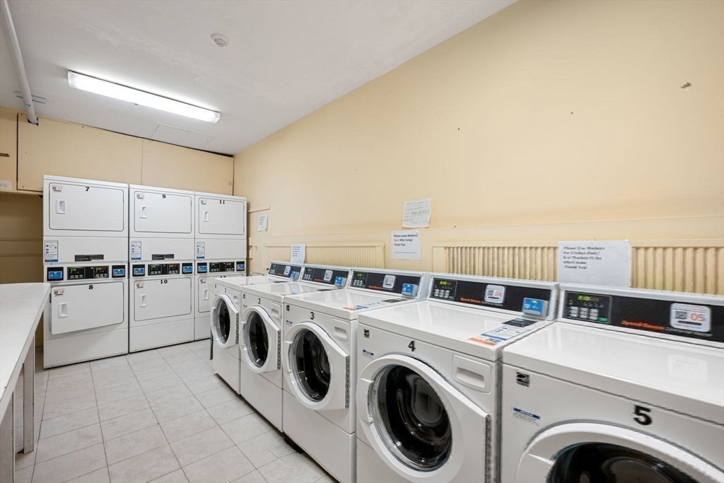 350 West Fourth Street, Unit 103 Boston, MA 02127 - Photo 28 of 33 a utility room with dryer and washer