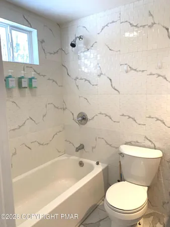 a bathroom with a bathtub