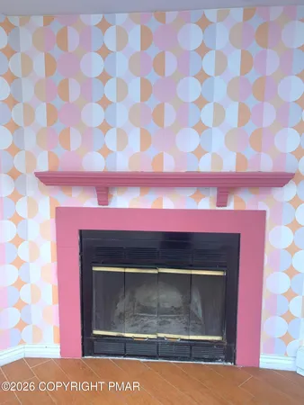 a fireplace with a clock on it