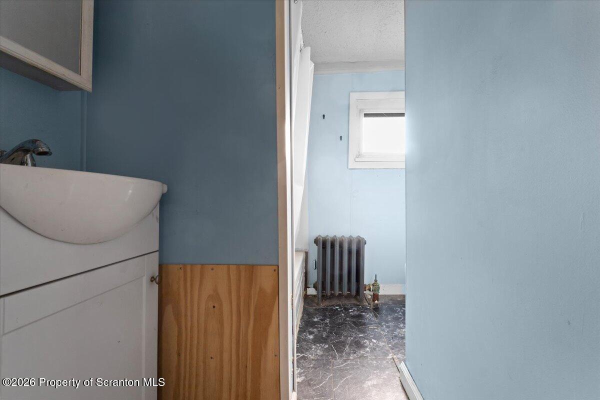 499 Meridian Avenue Scranton, PA 18504 - Photo 23 of 24 a view of a room that has a bed and a window in it