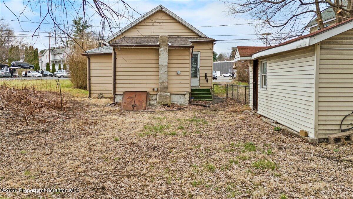 499 Meridian Avenue Scranton, PA 18504 - Photo 9 of 24 a front view of a house with garden