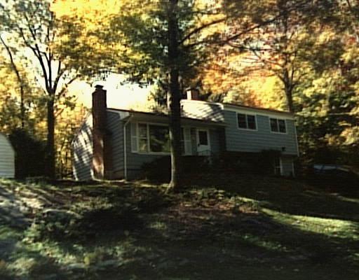 25 Bob Hill Road Ridgefield, CT 06877 - Photo 1 of 1 front view of a house with a yard