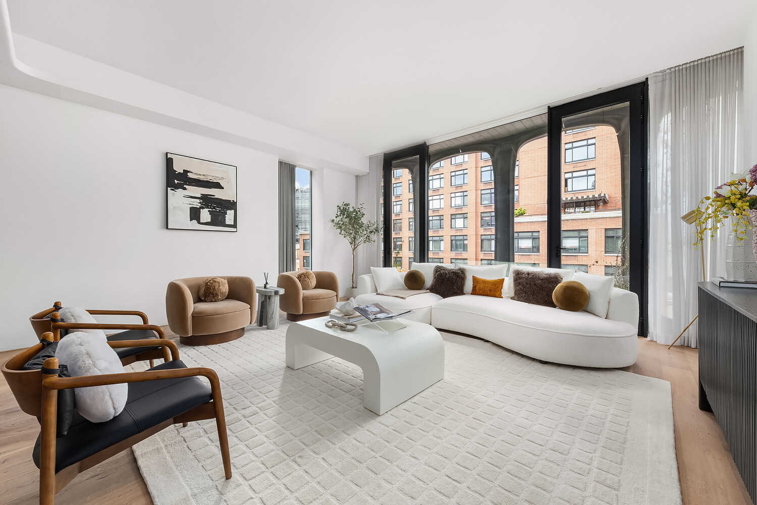 325 West Broadway, Unit 7B Manhattan, NY 10013 - Photo 3 of 19 a living room with furniture and floor to ceiling windows