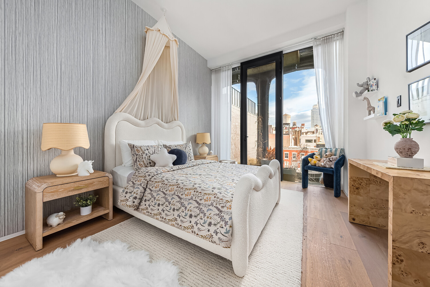 325 West Broadway, Unit 7B Manhattan, NY 10013 - Photo 9 of 19 a bedroom with a bed a table and chair