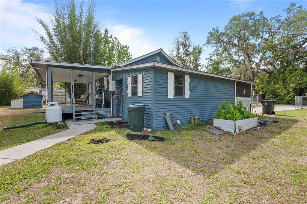 110 County Road 534 Bushnell, FL 33513 - Photo 47 of 60 a view of a house with a patio
