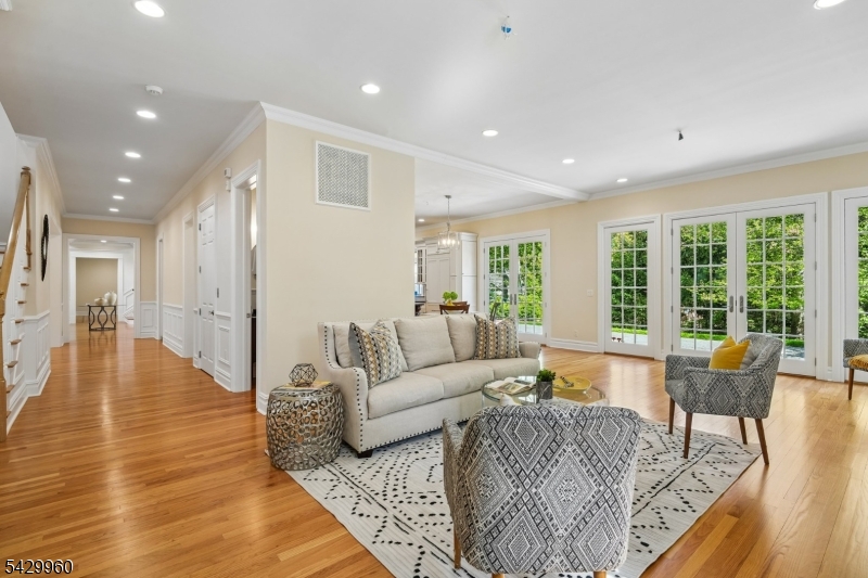6 Grosvenor Road Short Hills, NJ 07078 - Photo 13 of 50 a living room with furniture and a large window