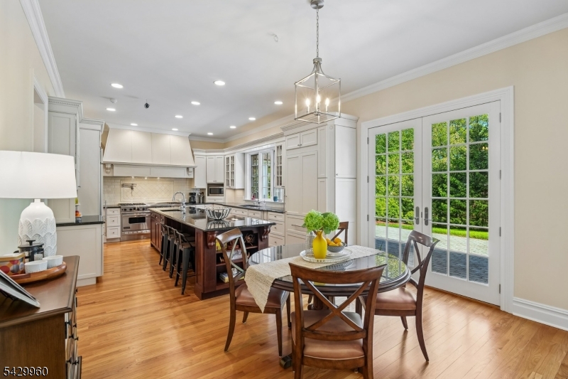 6 Grosvenor Road Short Hills, NJ 07078 - Photo 15 of 50 a view of a dining room with furniture window and wooden floor