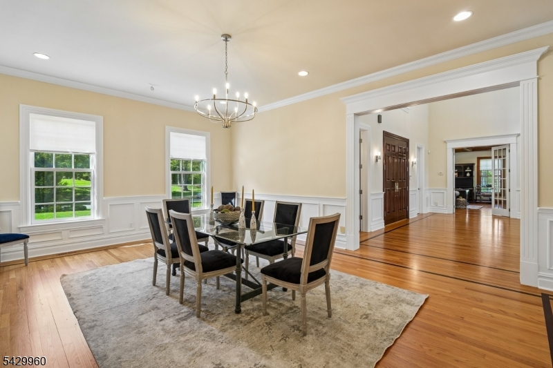6 Grosvenor Road Short Hills, NJ 07078 - Photo 21 of 50 a view of a dining room with furniture window and wooden floor