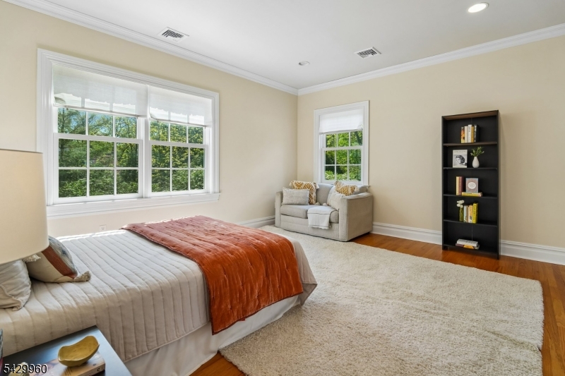 6 Grosvenor Road Short Hills, NJ 07078 - Photo 33 of 50 a bedroom with a bed and a large window