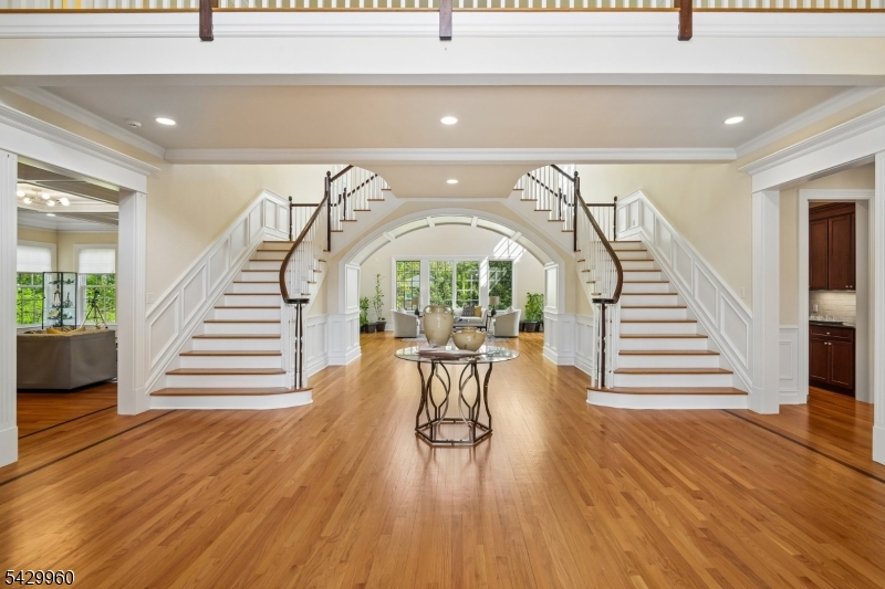 6 Grosvenor Road Short Hills, NJ 07078 - Photo 5 of 50 a view of entryway and hall with wooden floor