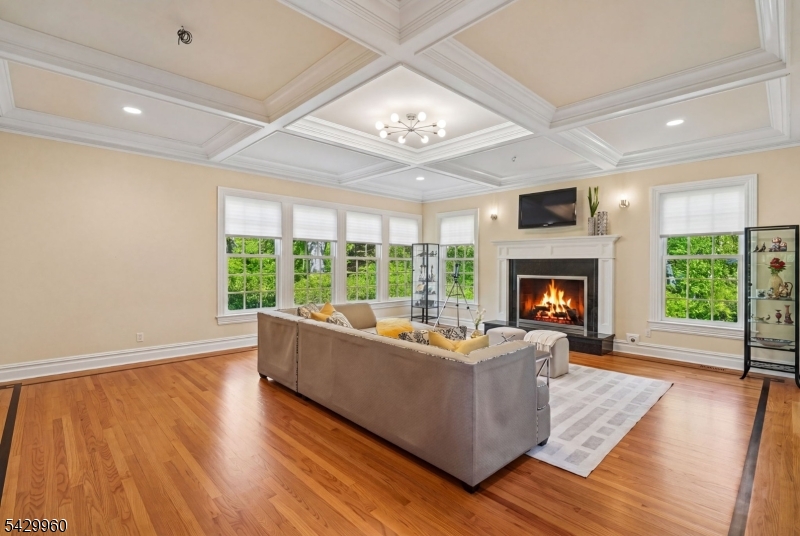 6 Grosvenor Road Short Hills, NJ 07078 - Photo 8 of 50 a living room with furniture and a fireplace