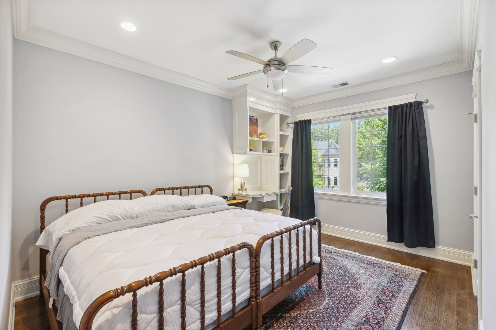 923 Harvard Lane Wilmette, IL 60091 - Photo 22 of 42 a bedroom with a bed and wooden floor