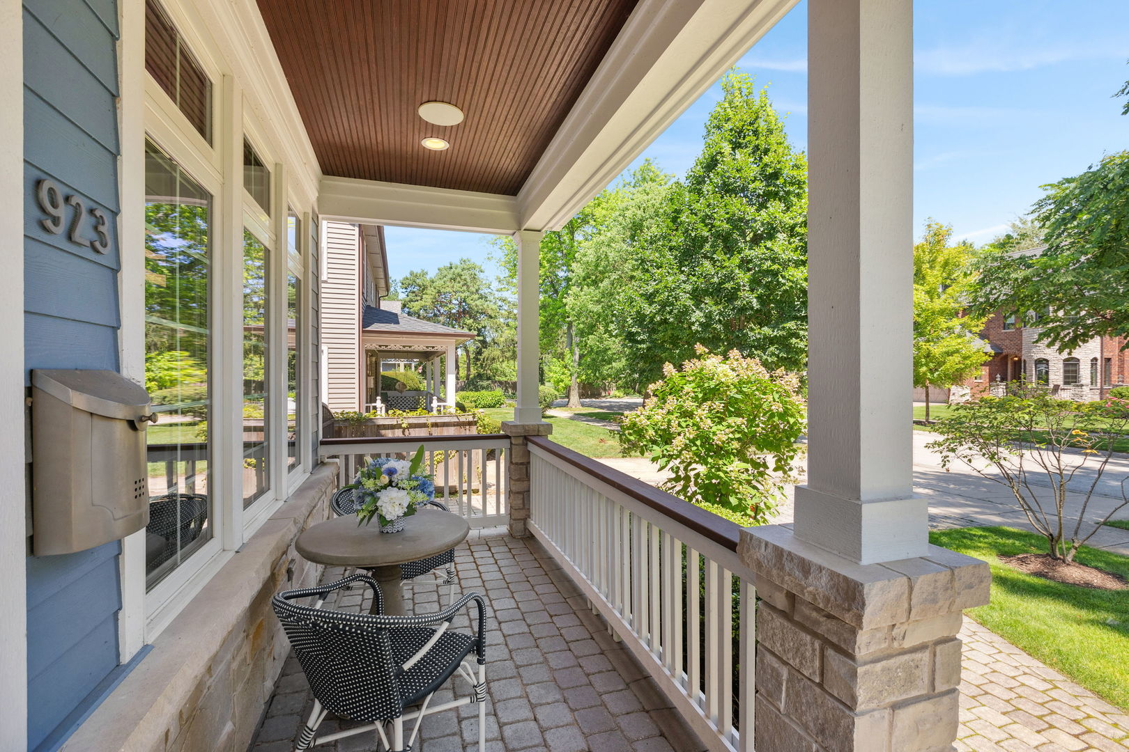 923 Harvard Lane Wilmette, IL 60091 - Photo 3 of 42 a view of a porch with furniture and garden