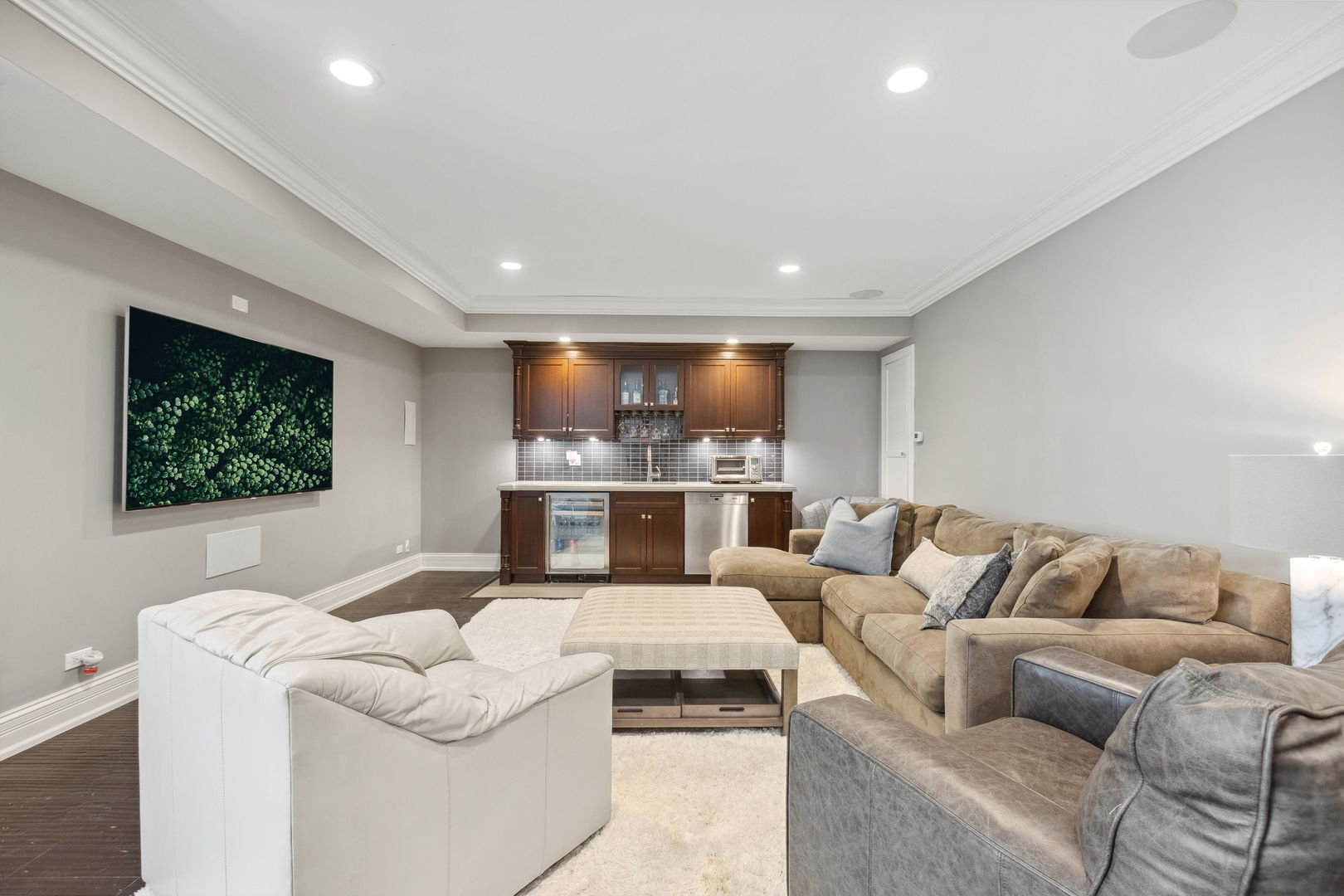 923 Harvard Lane Wilmette, IL 60091 - Photo 32 of 42 a living room with furniture and a flat screen tv