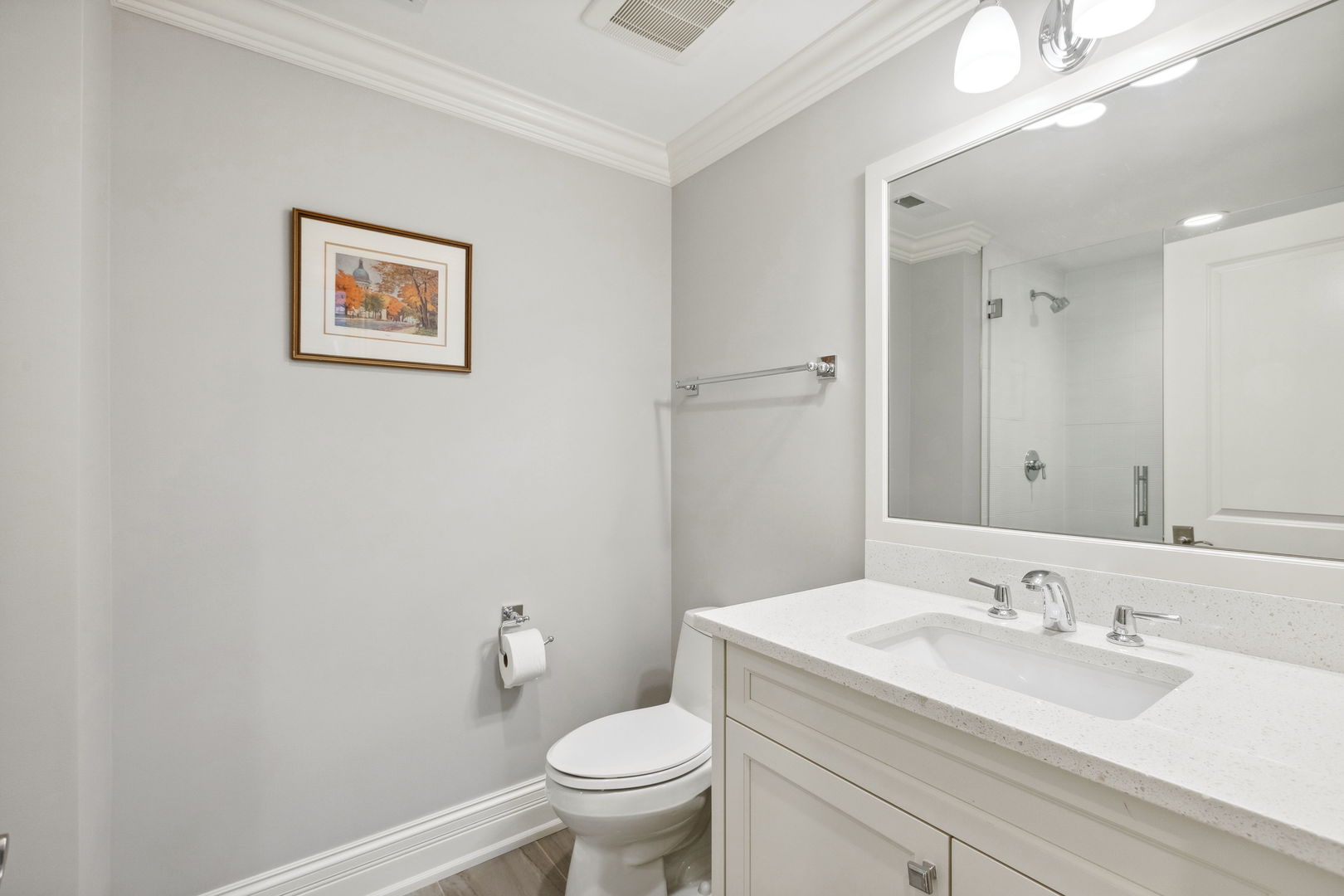 923 Harvard Lane Wilmette, IL 60091 - Photo 36 of 42 a bathroom with a granite countertop sink mirror vanity and toilet