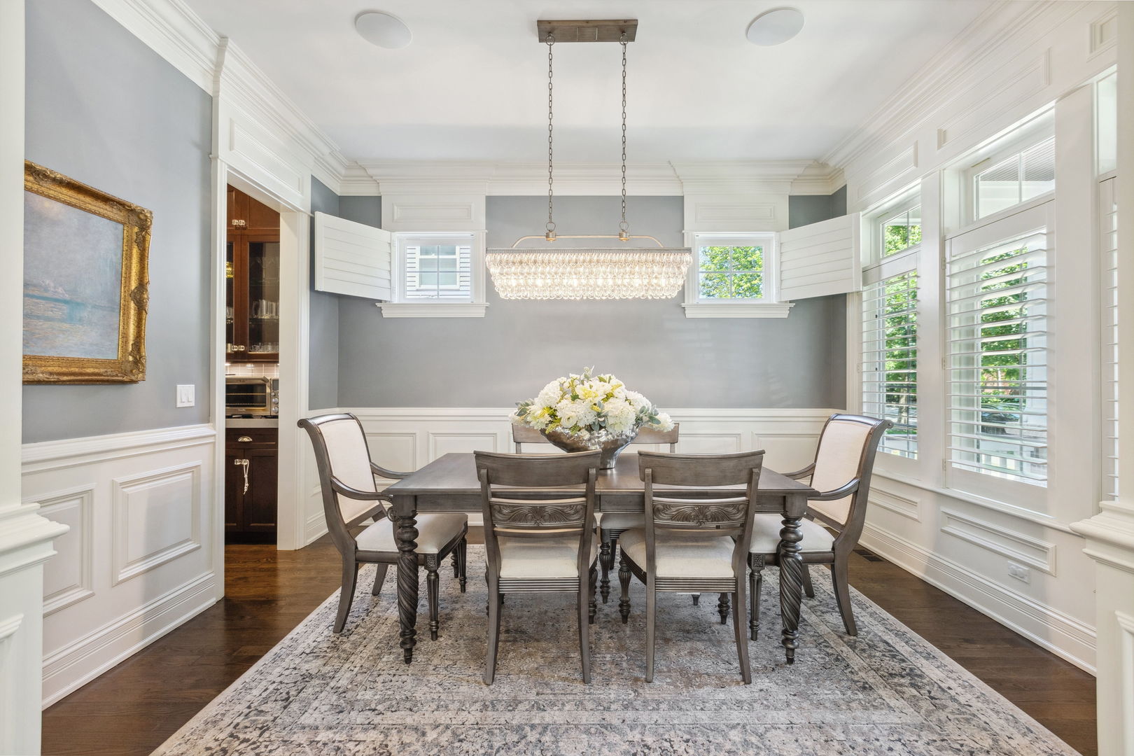 923 Harvard Lane Wilmette, IL 60091 - Photo 6 of 42 a view of a dining room with furniture window and wooden floor