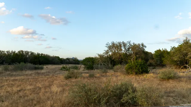 a view of mountain with lake view