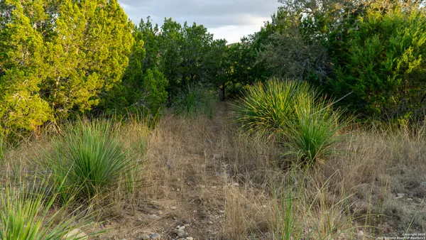 a view of a lake in between the top of a building