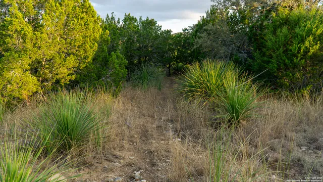 a view of a lake in between the top of a building