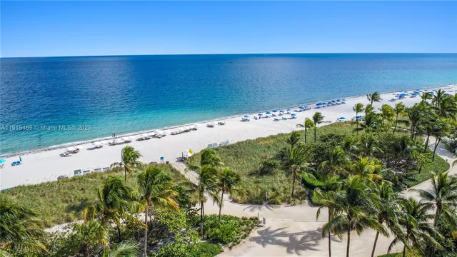 an aerial view of beach and ocean