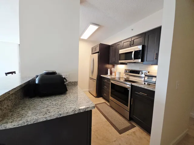 a bathroom with a sink double vanity and a mirror