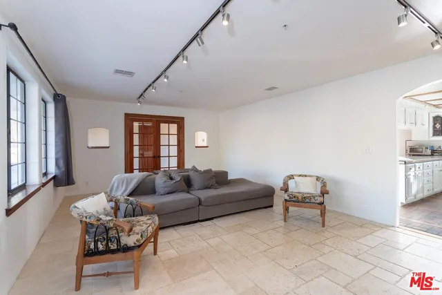 a bathroom with a sink a toilet and a tub