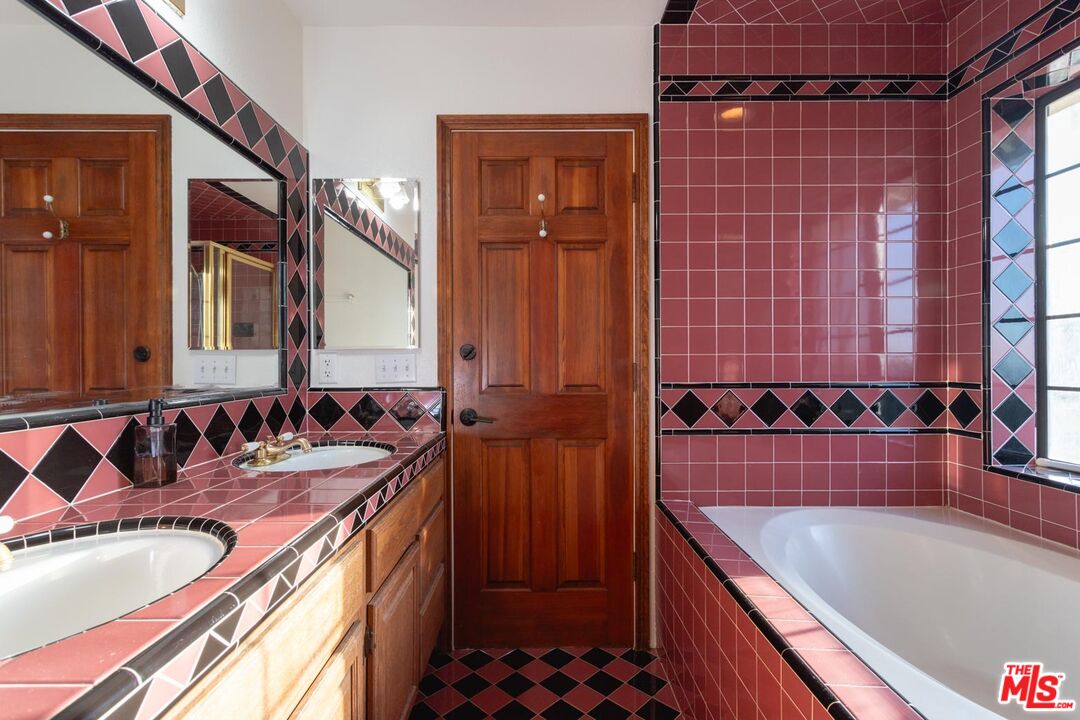 29243 Piani Road Pearblossom, CA 93553 - Photo 19 of 64 a bathroom with a bathtub and a sink