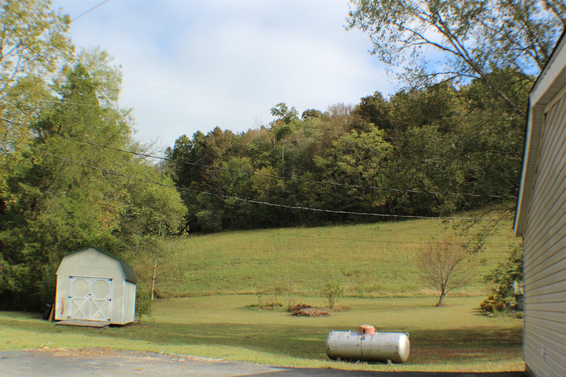 1268 Bull Run Road Lynchburg, TN 37352 - Photo 18 of 21 Back yard is beautiful and comes with a 10x12 storage building.