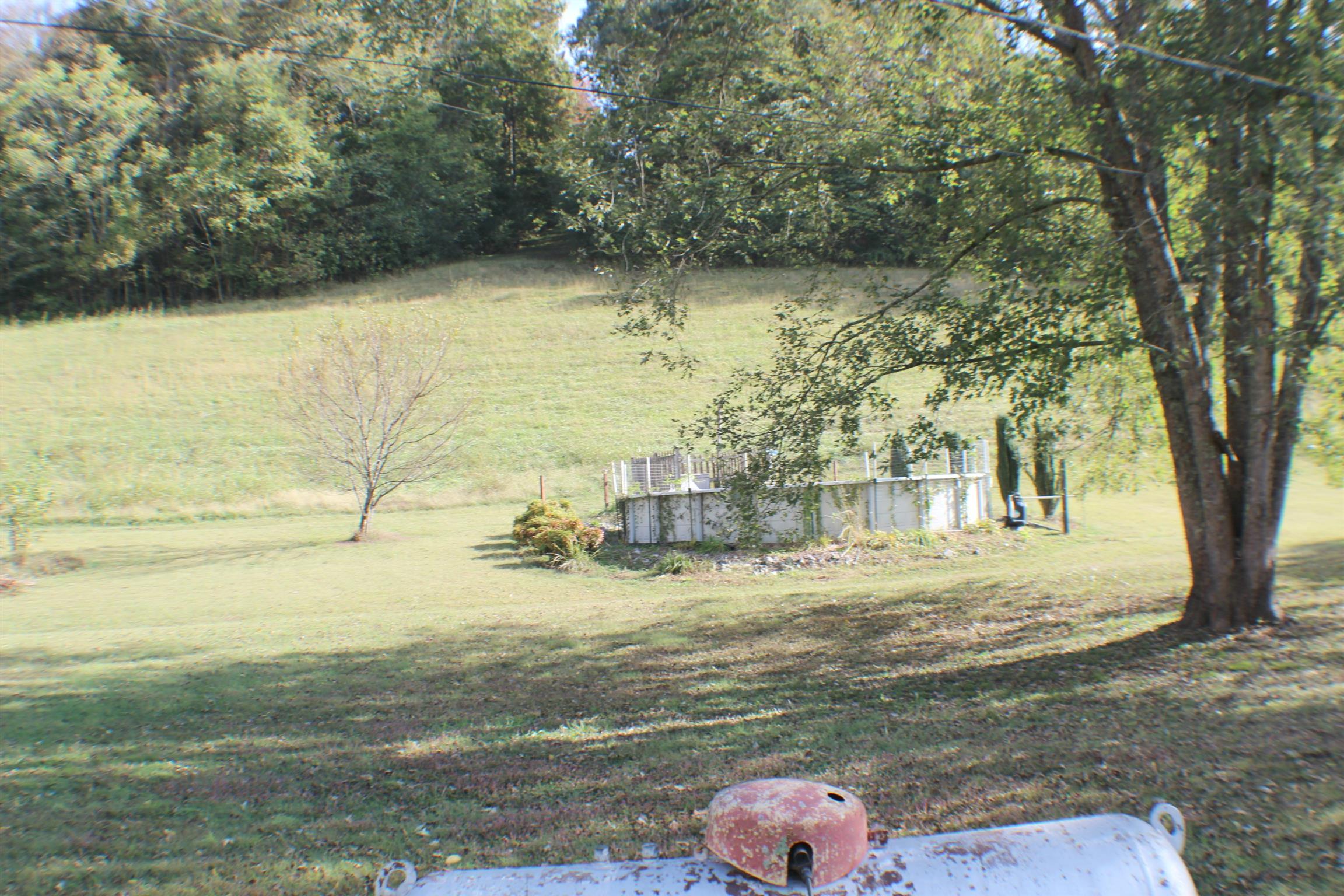 1268 Bull Run Road Lynchburg, TN 37352 - Photo 19 of 21 The back yard has a above ground pool.
