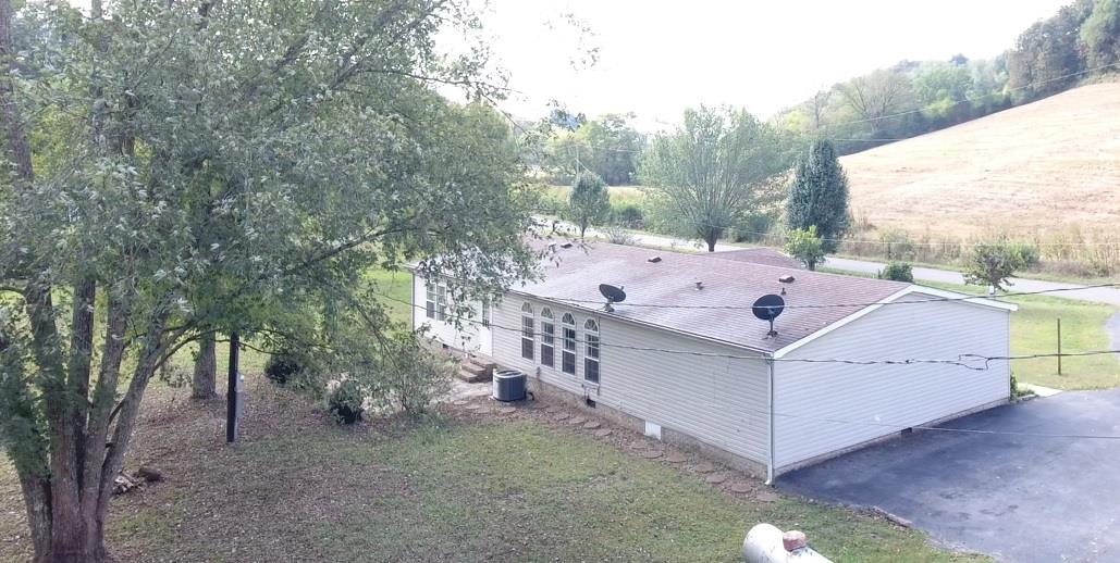 1268 Bull Run Road Lynchburg, TN 37352 - Photo 21 of 21 The back of the home has a patio space and room to play.