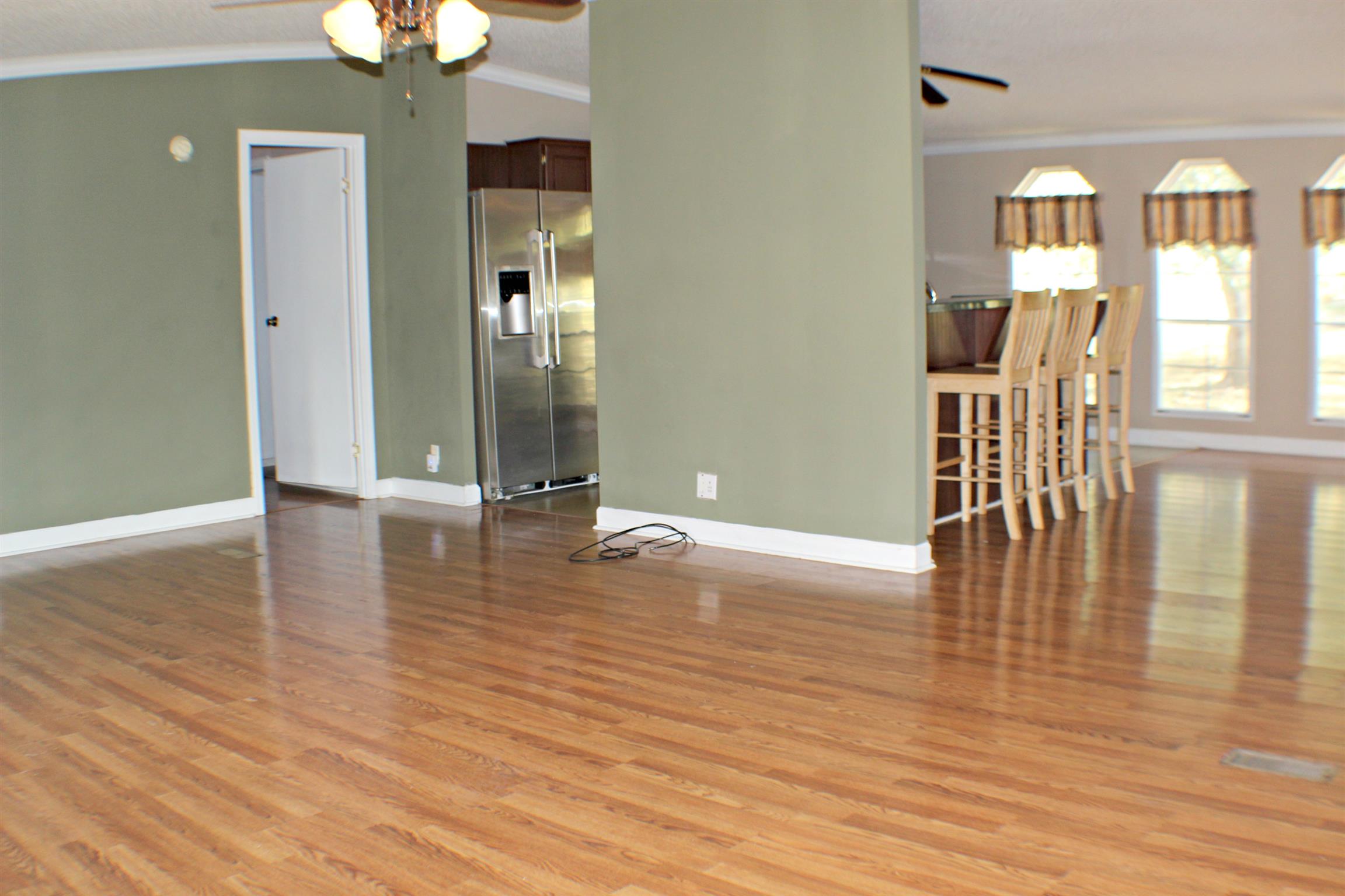 1268 Bull Run Road Lynchburg, TN 37352 - Photo 7 of 21 Huge living area complete with a fireplace and gas logs.