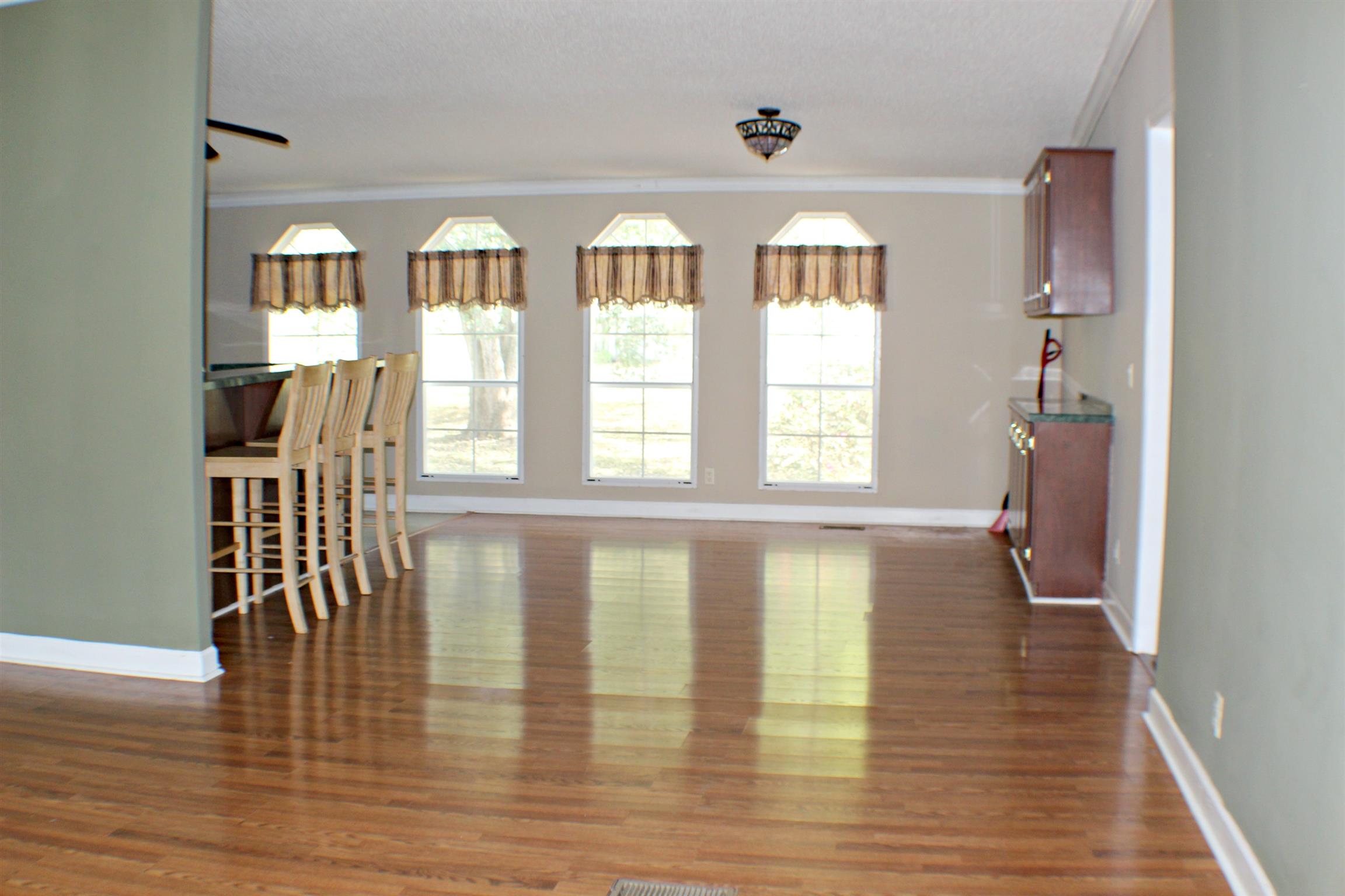 1268 Bull Run Road Lynchburg, TN 37352 - Photo 8 of 21 Dining area has beautiful natural lighting and a built in china hutch.